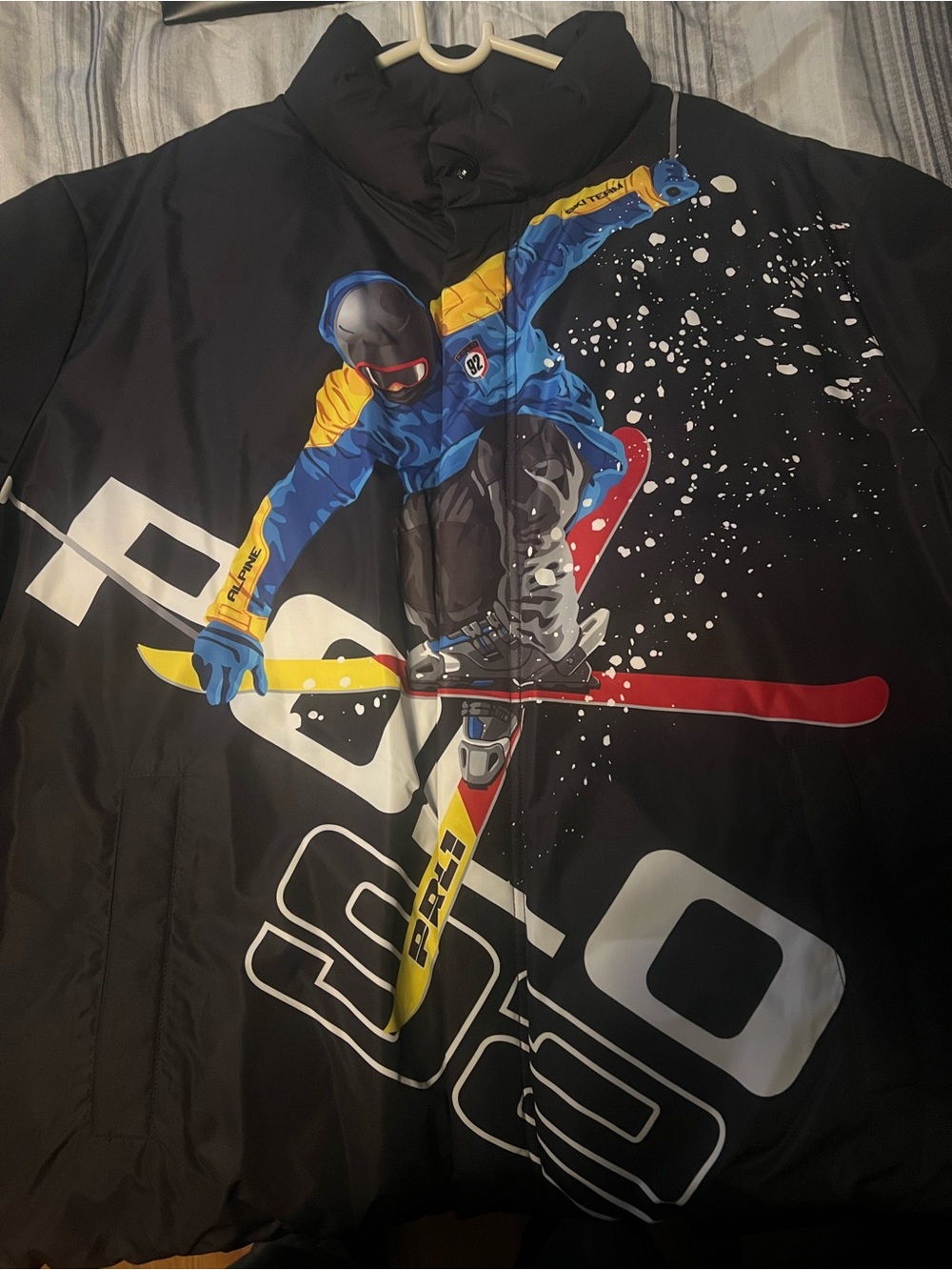 Alpine Black Jacket with Blue, Yellow & Red Ski Graphic